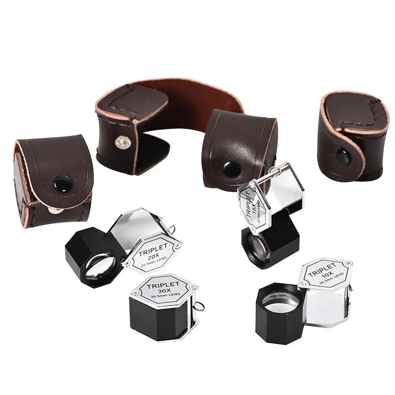 Handheld metal and optical glass magnifying glass for jewellery, stamp, and coin identification with 10x to 30x magnification.