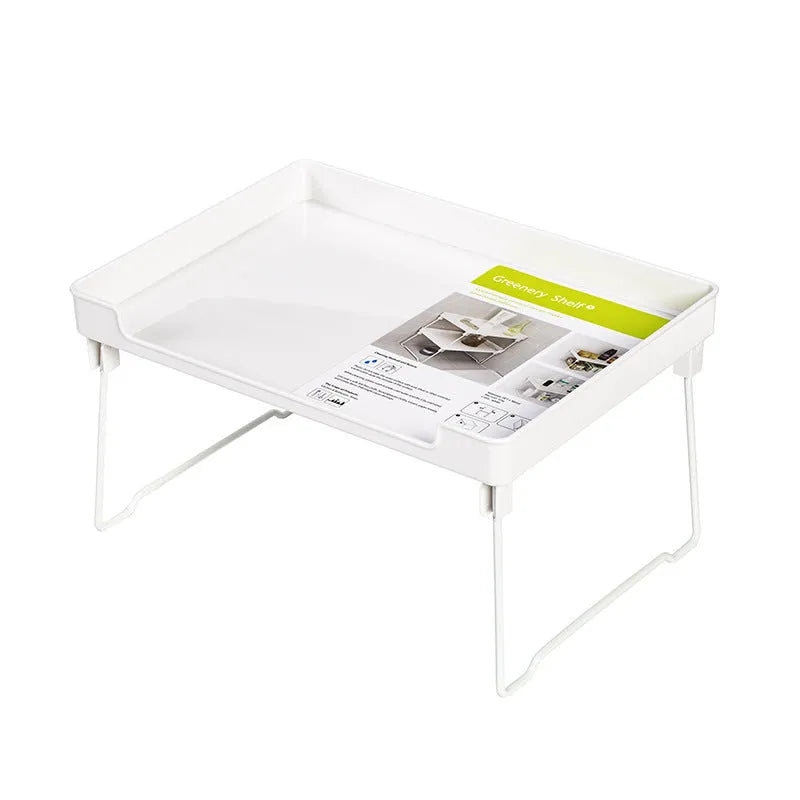 Transparent and white plastic kitchen supplies rack with multiple compartments for drawer and shelf organisation