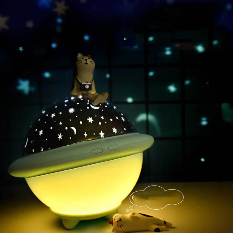UFO-shaped starry sky light projection lamp in green, pink, or white, measuring 15.1 cm wide