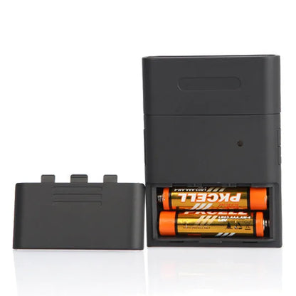 Black At-838 digital alcohol breathalyser on a plain background.