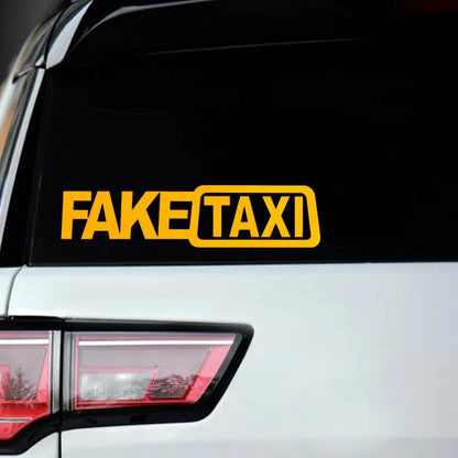 Waterproof FAKE TAXI car sticker in black, 20cm by 8cm, on a vehicle window.