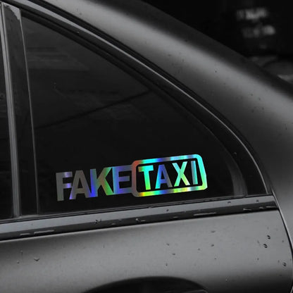 Waterproof FAKE TAXI car sticker in black, 20cm by 8cm, on a vehicle window.