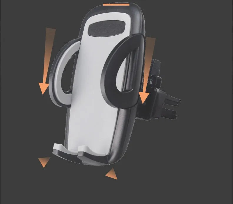 Black plastic mobile phone holder attached to a car air conditioning vent.