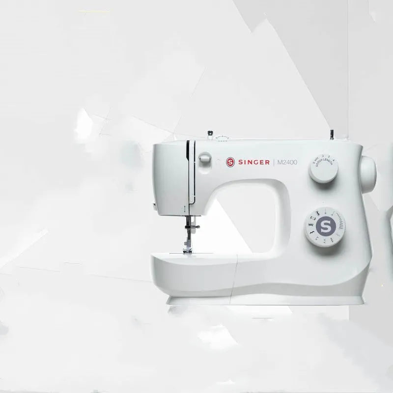 M2405 portable household sewing machine with accessories on table showing compact 47x39x26cm size