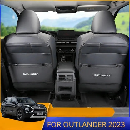 Set of three leather anti-kick protection pads for a Mitsubishi Outlander car interior.