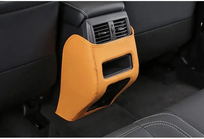 Set of three leather anti-kick protection pads for a Mitsubishi Outlander car interior.