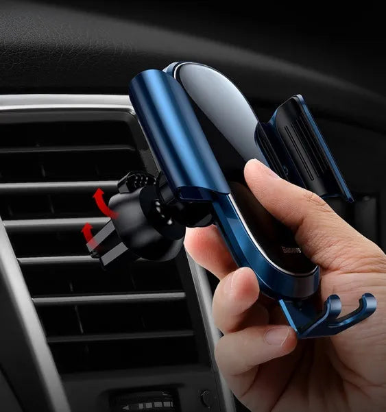 Universal car phone holder with adjustable swivel joint mounted on car windscreen holding smartphone