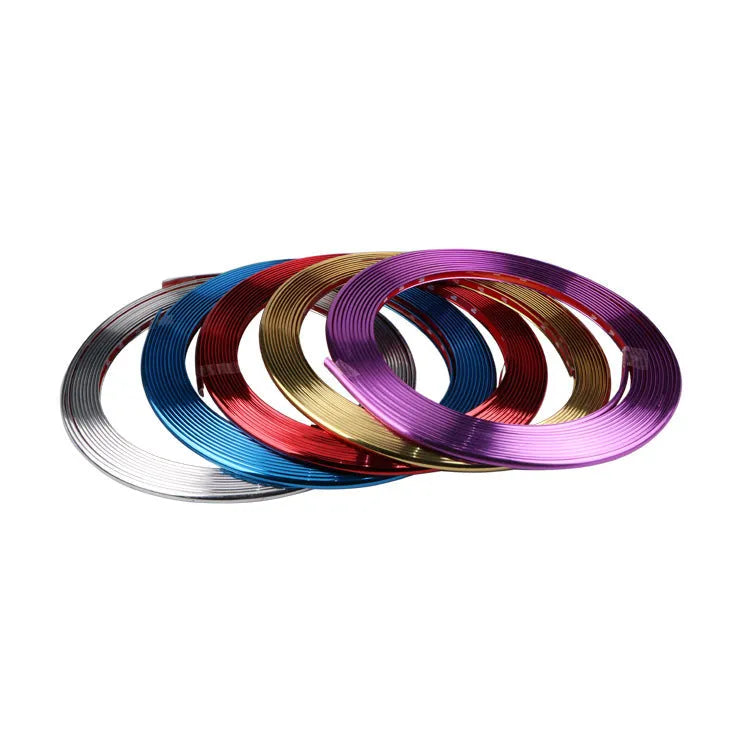 Electroplated purple wheel hub trim stickers on 8 metre roll with anti-collision strip