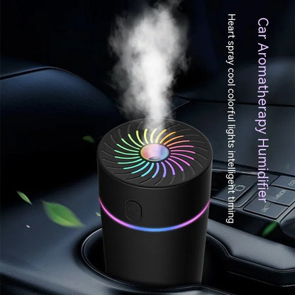 Compact car USB humidifier with aromatherapy function, showing plug-in and battery models in black and white colours