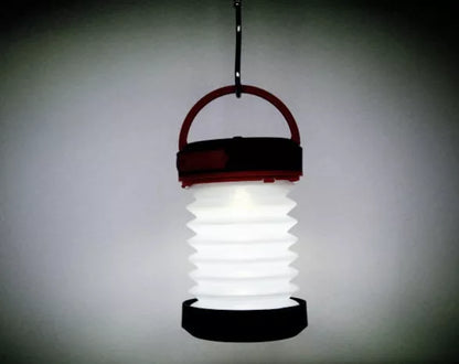 SolarBoom Collapsible Lantern with solar panel and USB charging port in green