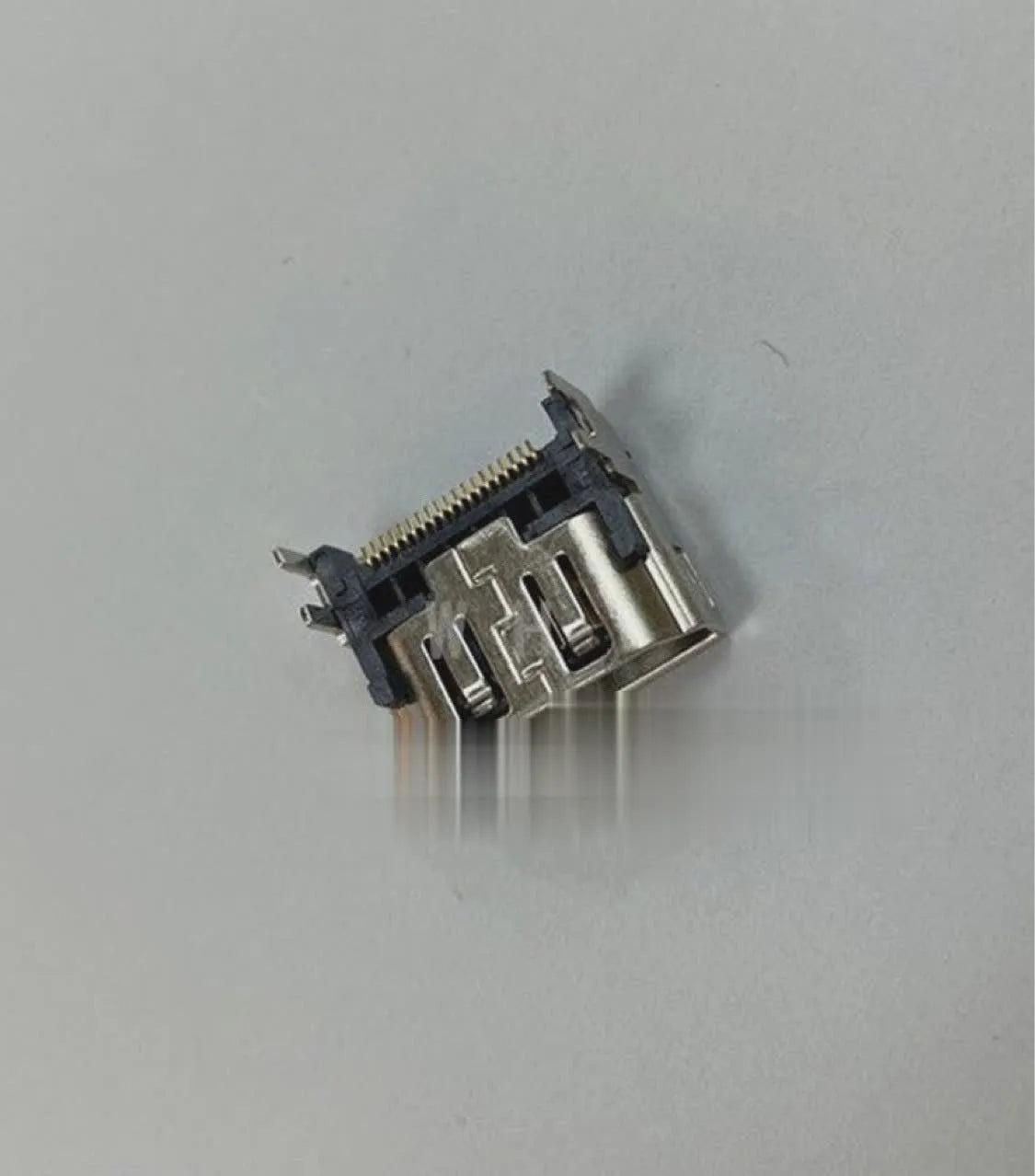 Silver HDMI interface host socket showing 19-pin configuration and nickel-plated brass construction