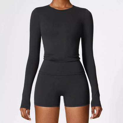 Women's slim long sleeve pullover top for yoga and fitness in various colors