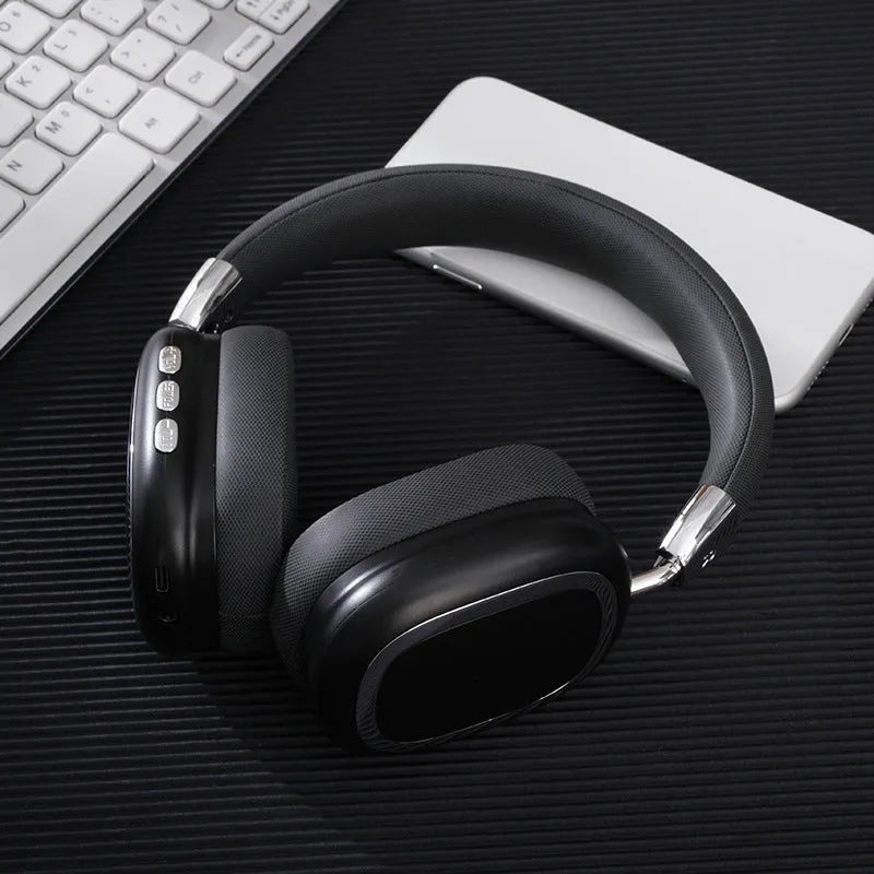 Bluetooth over-ear headset in dark black with 40mm subwoofer speaker, Type-C port, and PC ABS frame