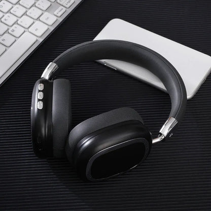 Bluetooth over-ear headset in dark black with 40mm subwoofer speaker, Type-C port, and PC ABS frame