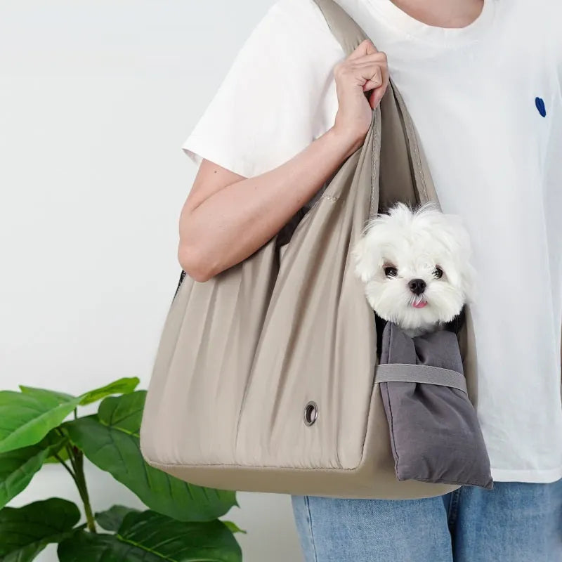 Apricot coloured soft cloth portable pet carrier handbag for small dogs and cats.