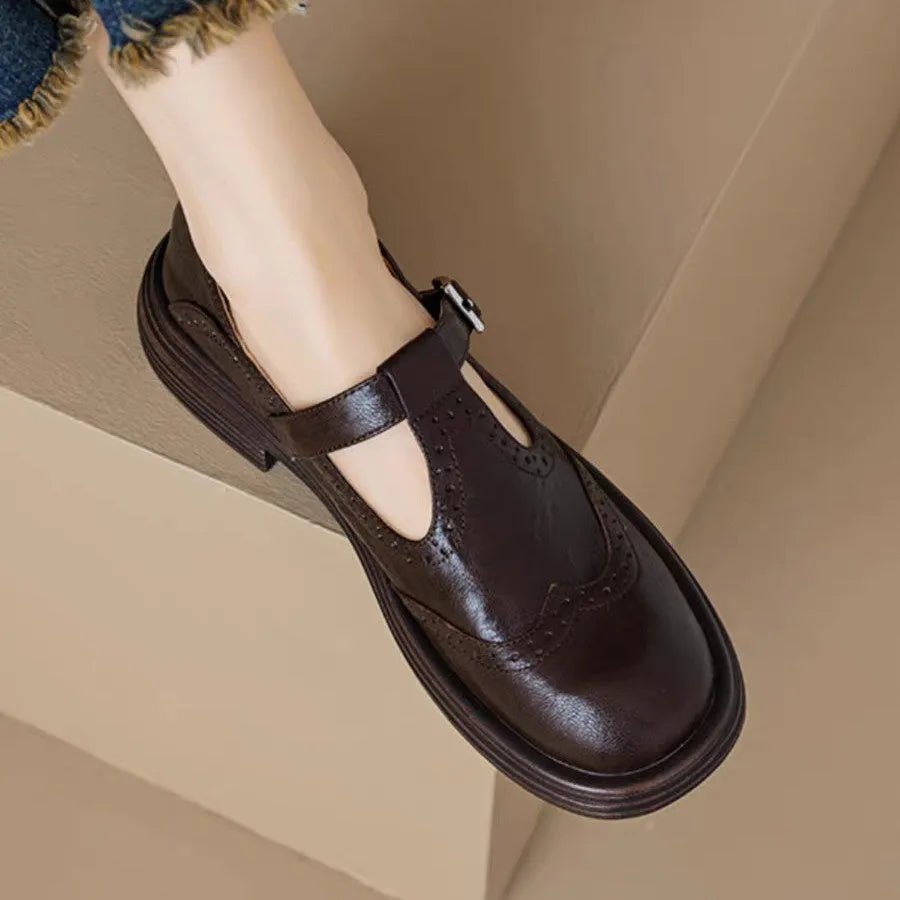 Women's sheepskin leather flat shoes with round toe in black and brown colour options