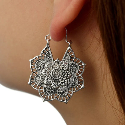 Vintage floral openwork metal earrings showcasing ethnic style and elegance