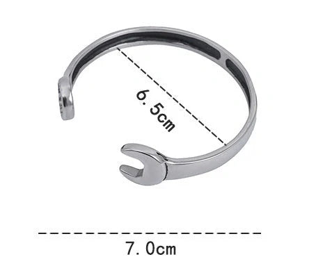 Sleek stainless steel personalized wrench bracelet with adjustable clasp, showcasing industrial-chic style