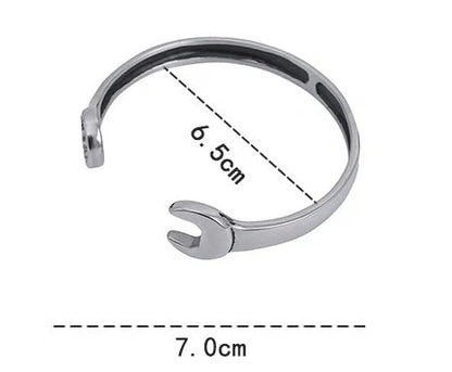 Sleek stainless steel personalized wrench bracelet with adjustable clasp, showcasing industrial-chic style