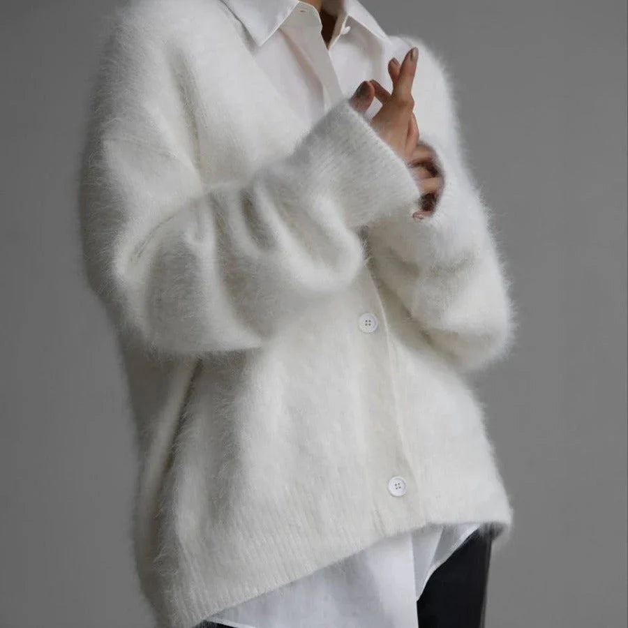 Cozy oversized cardigan with v-neck, button front, and variety of color options for women