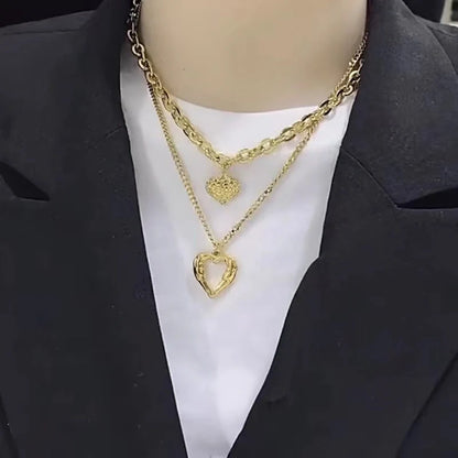 Stylish Titanium Steel Angel Wings Heart Necklace for Women in silver and golden finishes.