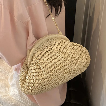 Women's paper straw beach shoulder bag in khaki colour with chain decorative elements