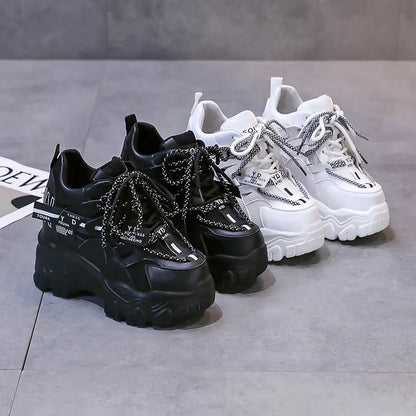 Women's white breathable mesh platform sports shoes with cross-strap detail and rubber sole