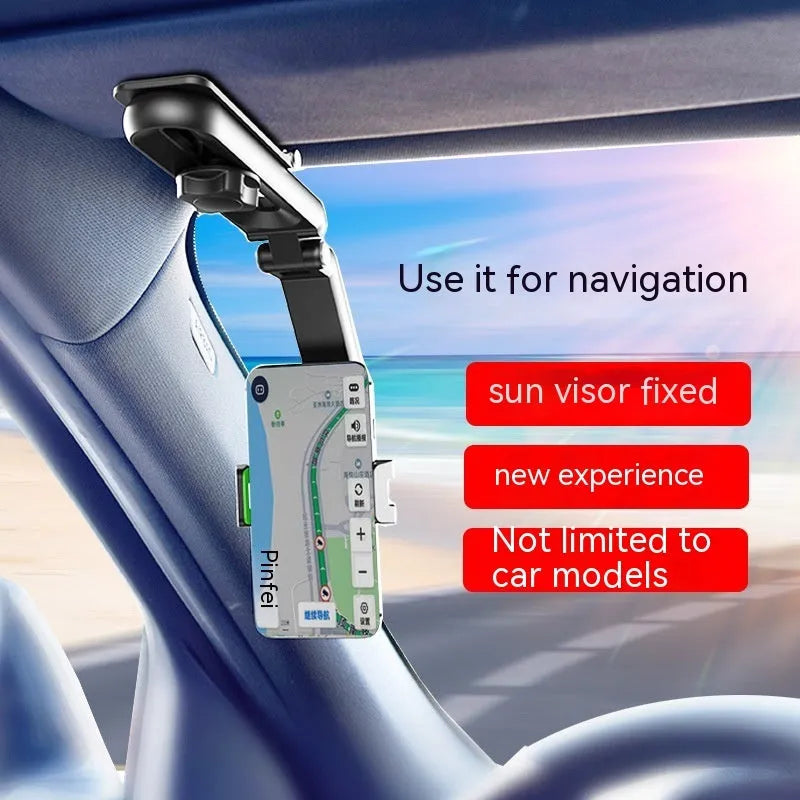Grey and green car phone bracket with adjustable clip mounted on a car dashboard