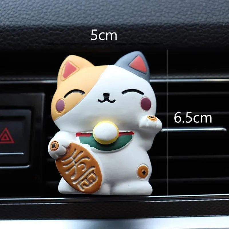 Resin cat-shaped car vent clip holding aromatherapy cotton for vehicle odour control