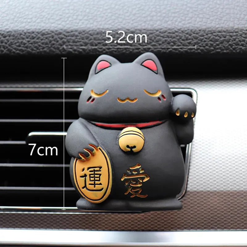 Resin cat-shaped car vent clip holding aromatherapy cotton for vehicle odour control
