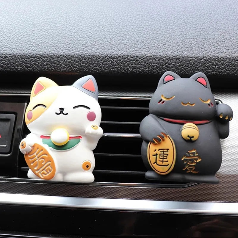 Resin cat-shaped car vent clip holding aromatherapy cotton for vehicle odour control
