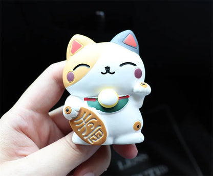 Resin cat-shaped car vent clip holding aromatherapy cotton for vehicle odour control