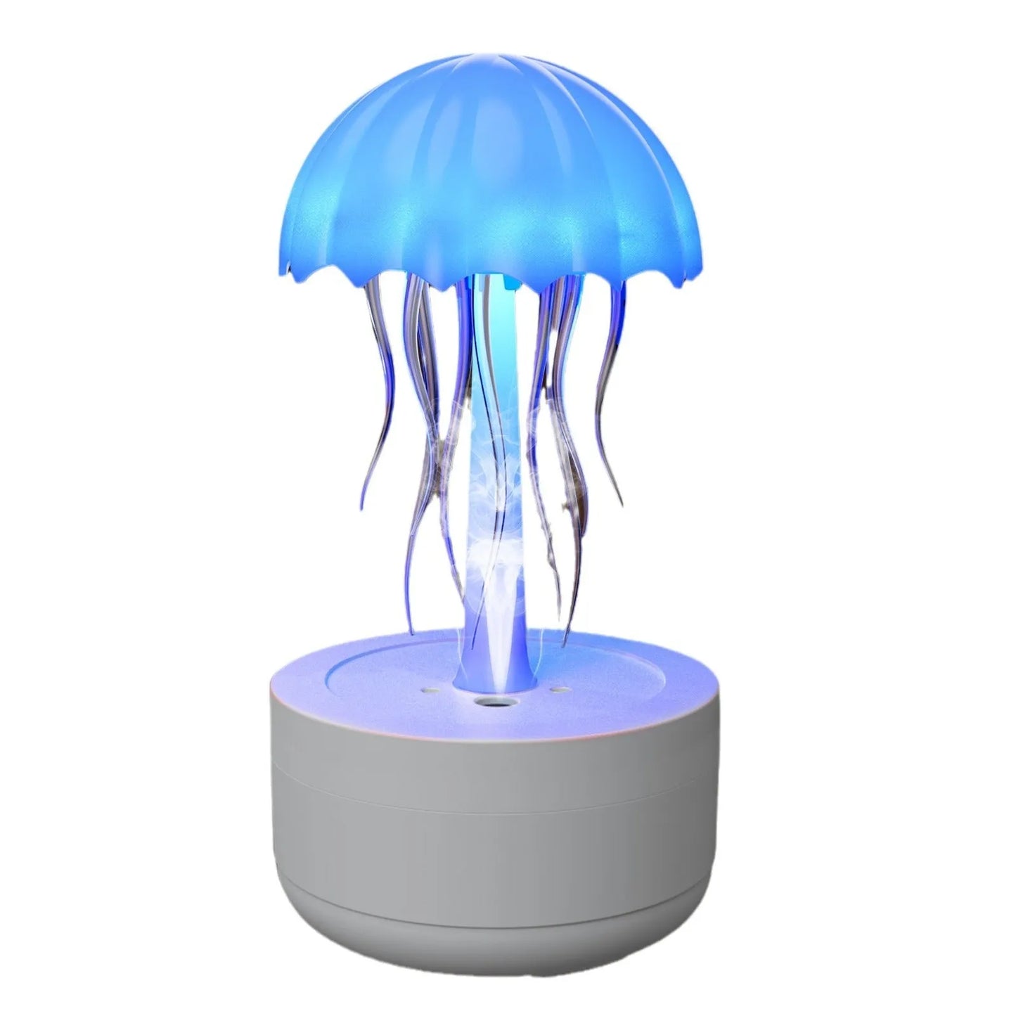 White resin jellyfish humidifier and essential oil diffuser with colourful night light on a desktop.