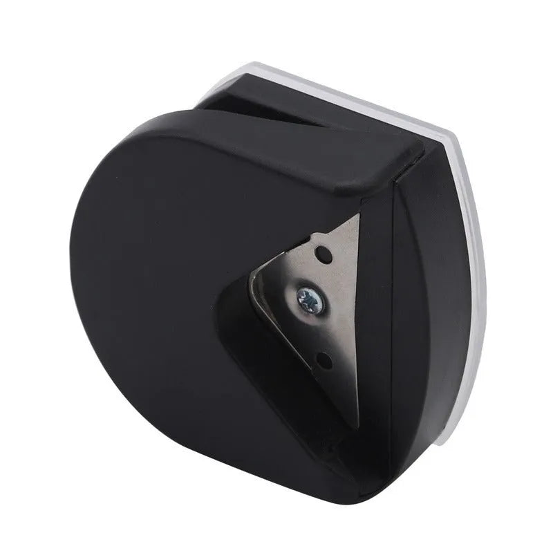 Black plastic and metal business card corner cutter on a white background