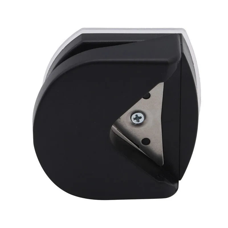 Black plastic and metal business card corner cutter on a white background