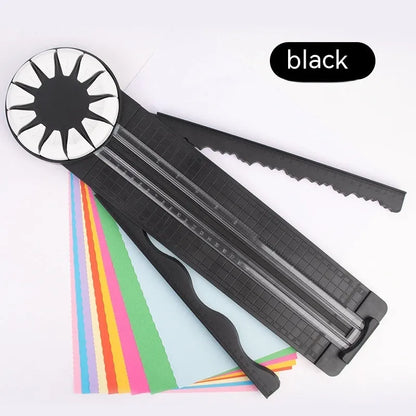 Pink 12-in-1 paper cutter with dotted guides measuring 46.2cm length on craft table