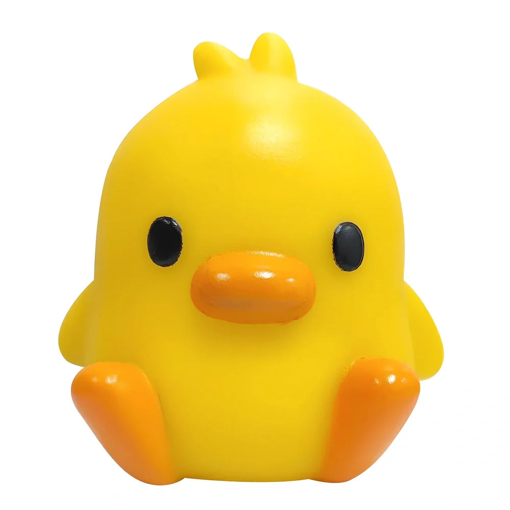 Small yellow duck-shaped night lamp measuring 6cm tall with warm LED light
