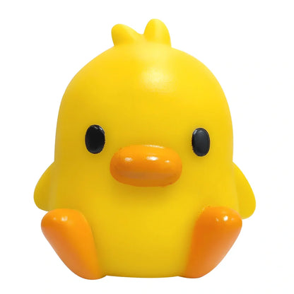 Small yellow duck-shaped night lamp measuring 6cm tall with warm LED light