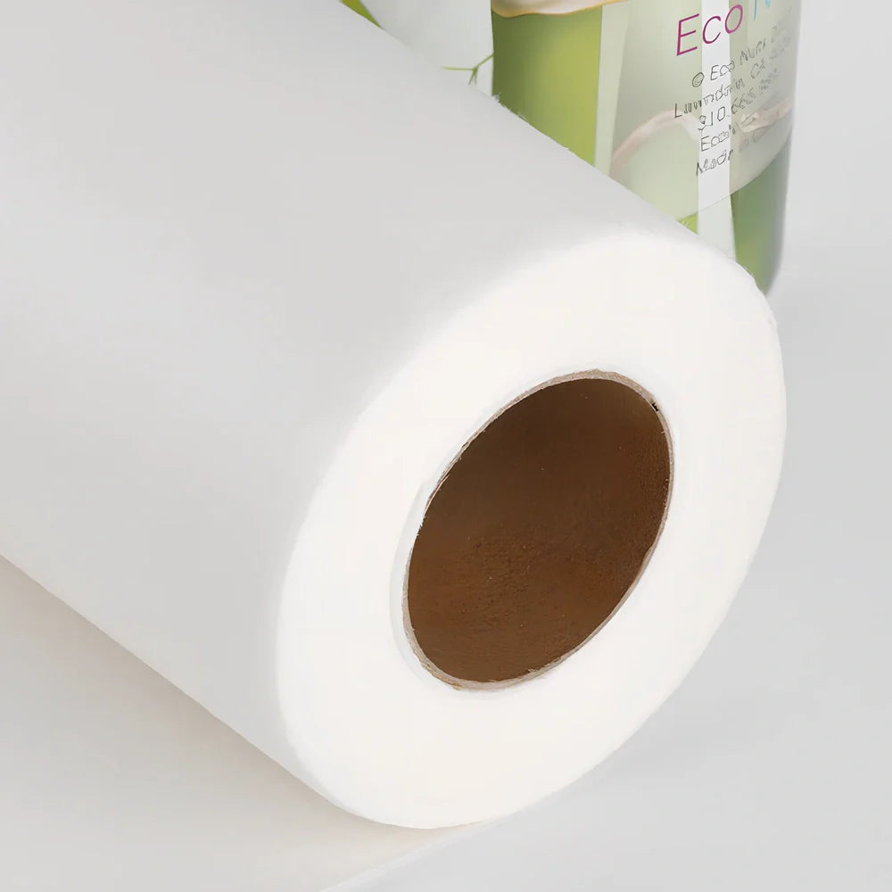 Roll of reusable bamboo paper towels showing thick fibre texture and sustainable packaging