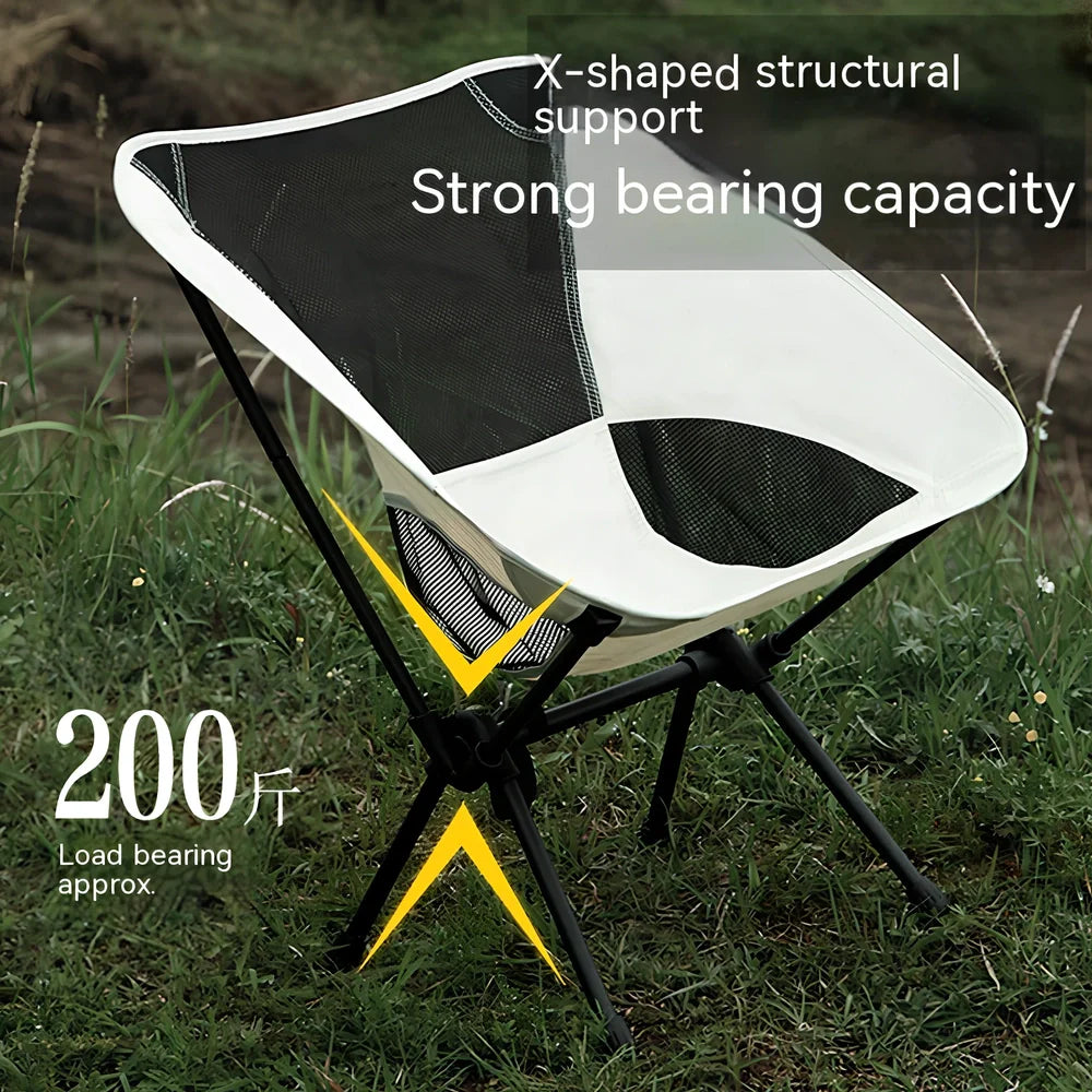 Outdoor folding chair with 600D Oxford cloth in ivory white, shown in folded position with storage bag