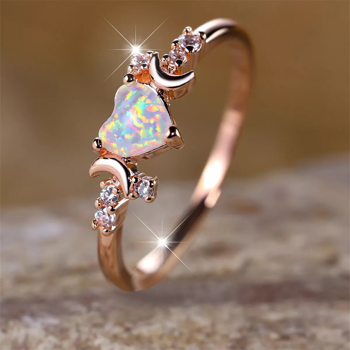 New Love Moon Three Claw Ring in platinum white opal and rose gold white opal