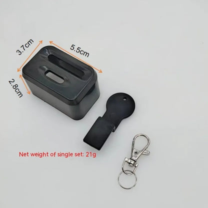 Black plastic seat belt lock clamp device shown on a car seat buckle.