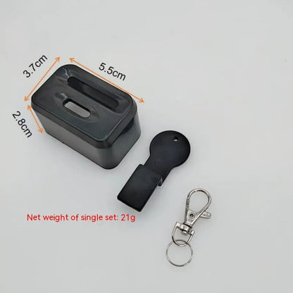 Black plastic seat belt lock clamp device shown on a car seat buckle.