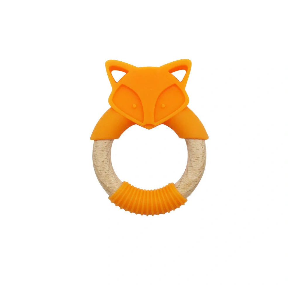 Wooden fox teether with orange silicone ring measuring 80mm high