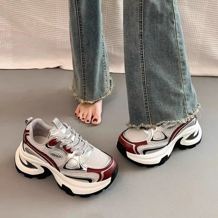 Women's silver and red mesh breathable platform sneakers with a round toe and lace-up front.