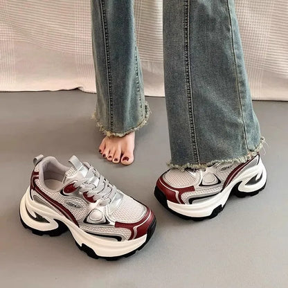 Women's silver and red mesh breathable platform sneakers with a round toe and lace-up front.