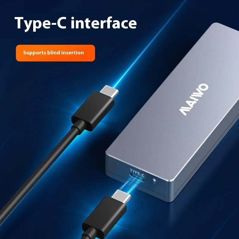 Aluminium Type-C external hard drive enclosure for M.2 SATA SSDs with included screwdriver and cables on a desk.