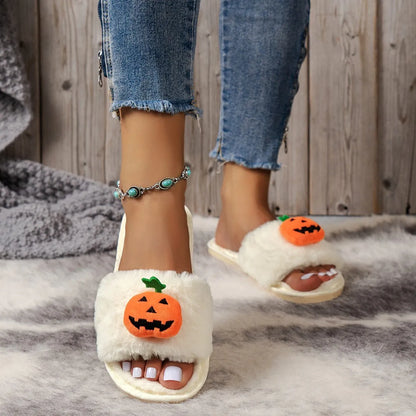 Yellow Halloween pumpkin plush open-toe slippers with synthetic fur and a light grey PVC anti-slip sole.
