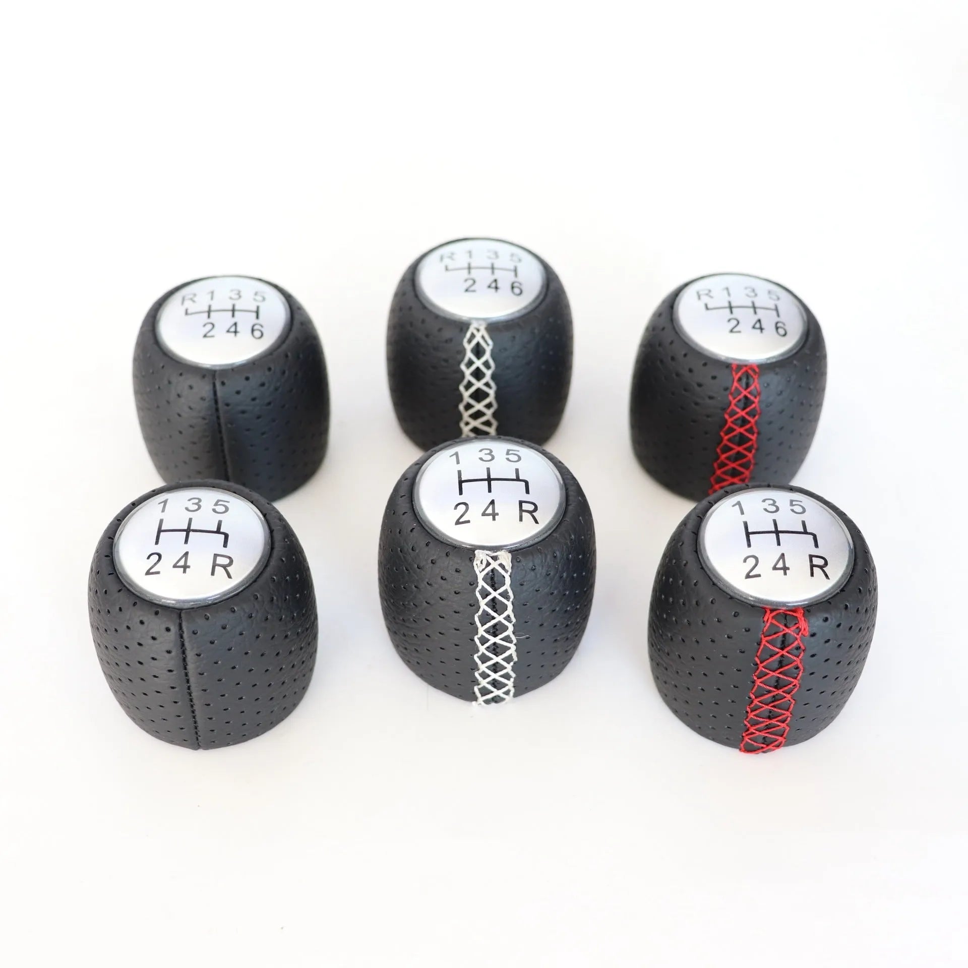 Alpha vehicle shift handball with wrapped perforated leather in black, red, or white line colours