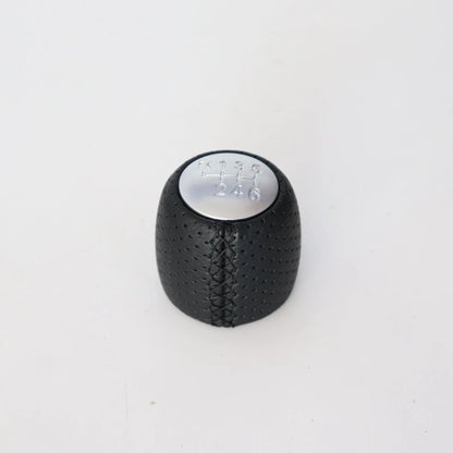 Alpha vehicle shift handball with wrapped perforated leather in black, red, or white line colours